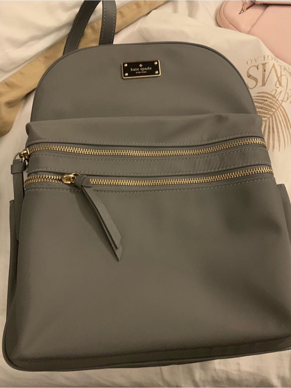 kate spade gray backpack with gold hardware